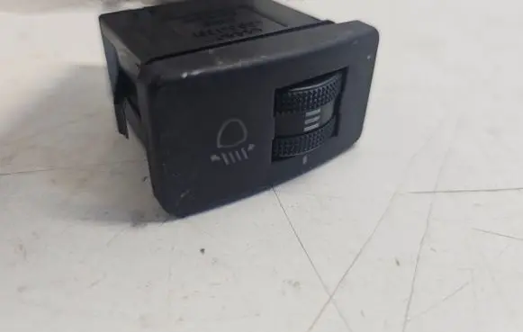 Headlight level height control switch