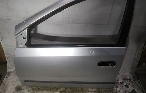 Nissan Almera Tino Front door pilkos