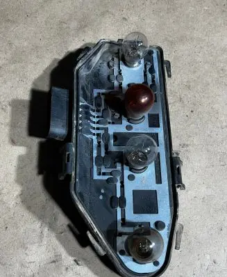 Volkswagen Transporter - Caravelle T5 Tail light bulb cover holder 7H0945257A