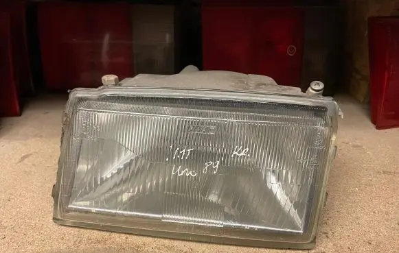 Fiat Uno Headlight/headlamp 16390 16377