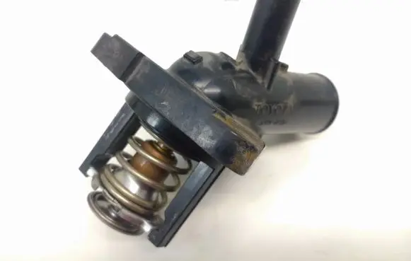 Thermostat/thermostat housing