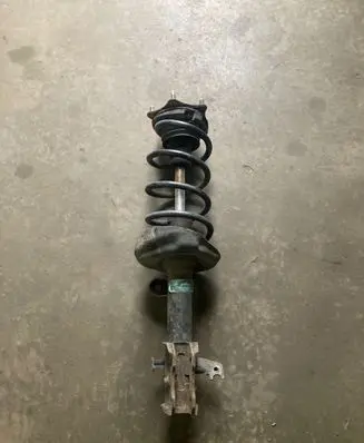 Front shock absorber with coil spring