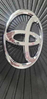 Toyota Corolla E210 E21 Manufacturers badge/model letters 754310D050