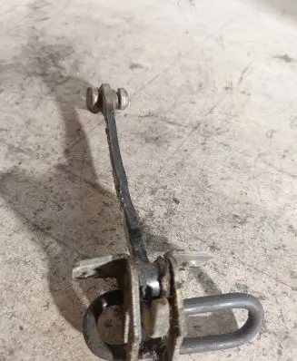 Opel Astra G Front door check strap stopper