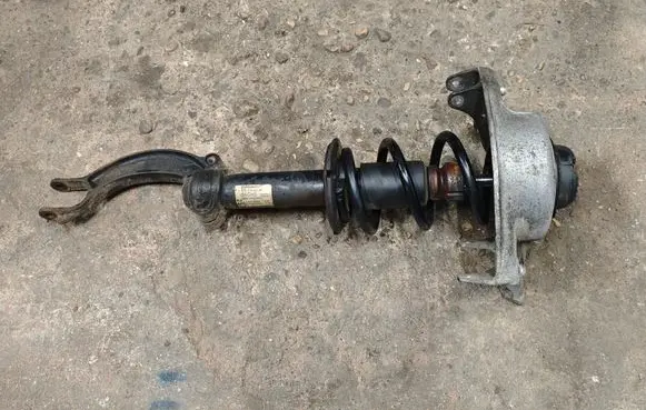 Front shock absorber with coil spring