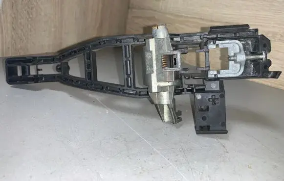 Rear door exterior handle/bracket