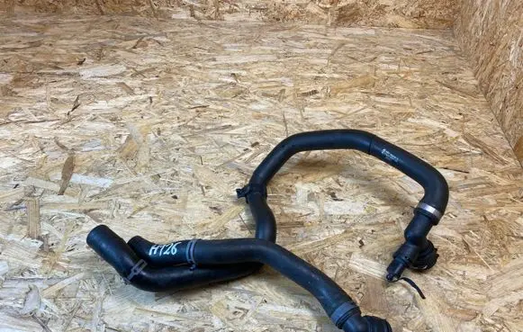 Volkswagen Golf VII Engine coolant pipe/hose 5Q0121049AC