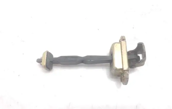 Front door check strap stopper