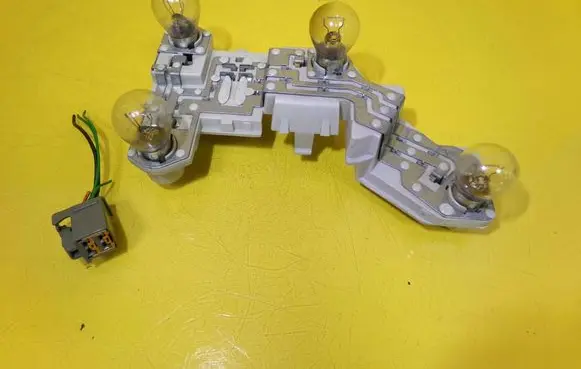 Volvo V50 Tail light bulb cover holder 281221