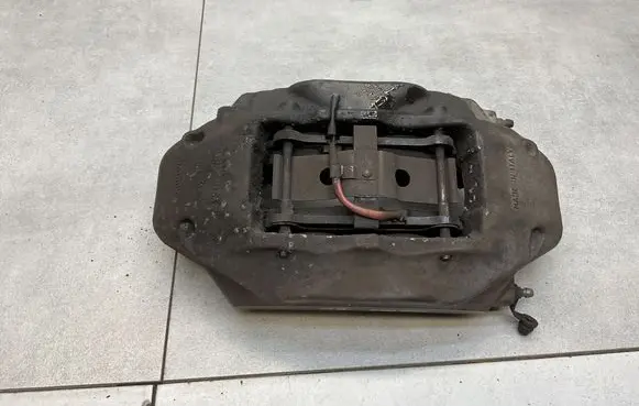 Volkswagen Touareg II Front brake caliper 