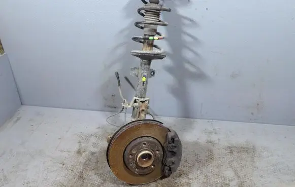 Dacia Duster Front shock absorber with coil spring