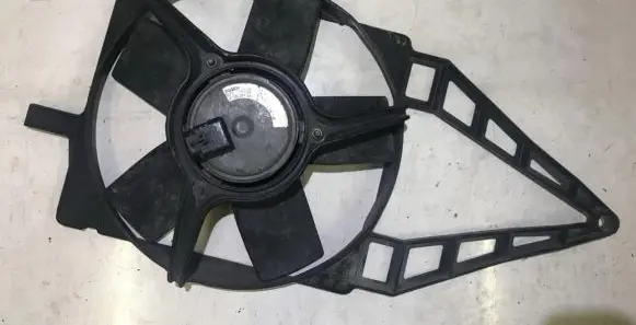 Opel Tigra A Radiator cooling fan shroud 0130304242 90469409