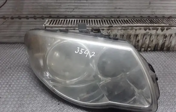 Chrysler Grand Voyager IV Headlight/headlamp 04857830AC
