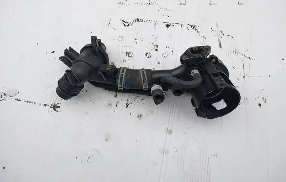 Thermostat/thermostat housing