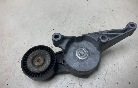 Volkswagen PASSAT B6 Alternator belt tensioner 03G903315C