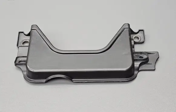 Engine bonnet/hood lock trim molding