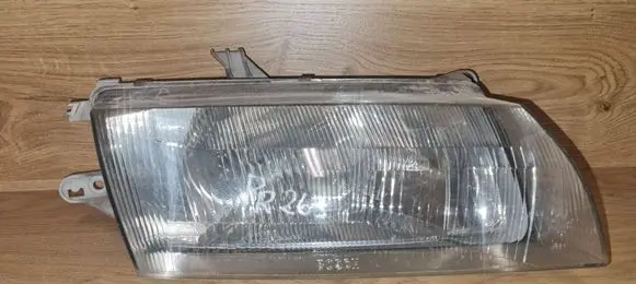 Mazda 323 Headlight/headlamp 1305235337