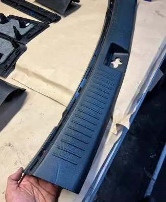 KIA Carens III Trunk/boot sill cover protection 85770A4000