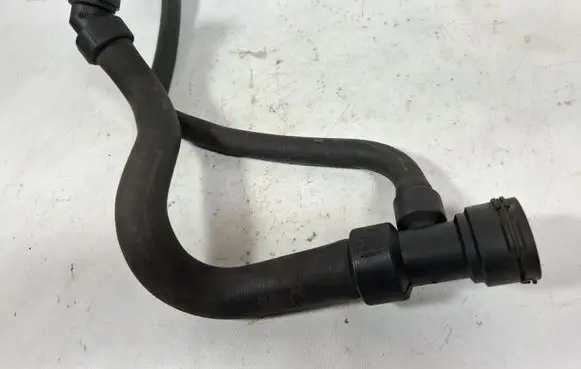 Volkswagen PASSAT B5 Engine coolant pipe/hose 8D0121055J