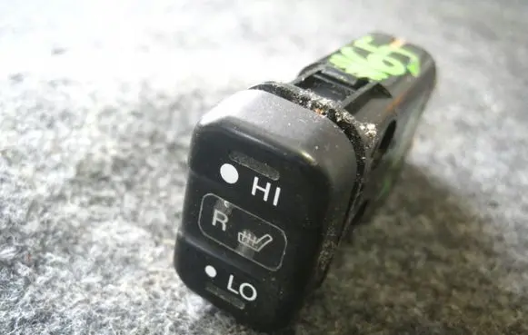 Seat heating switch