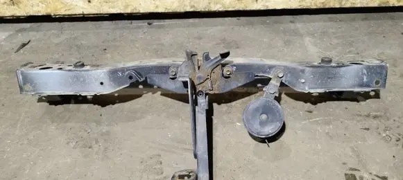Top upper radiator support slam panel