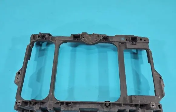 Radiator support slam panel