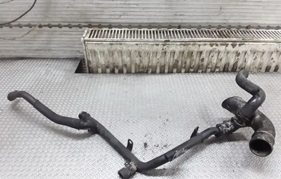Skoda Octavia Mk2 (1Z) Engine coolant pipe/hose 038121065CS