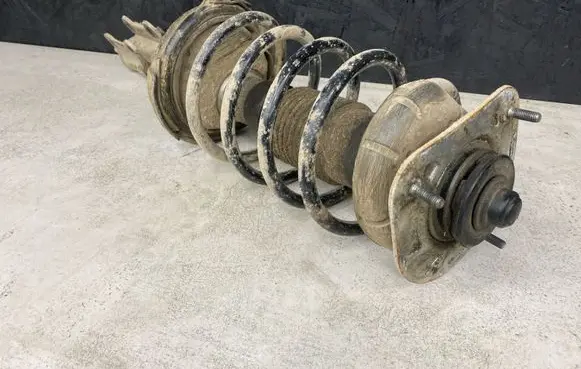 Front shock absorber with coil spring