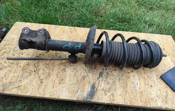 Opel Corsa D Front shock absorber/damper 13214354 GP27381