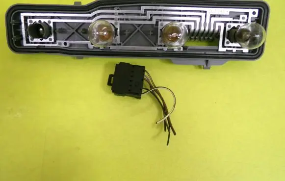 Opel Astra G Tail light bulb cover holder