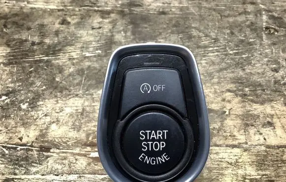 Engine start stop button switch