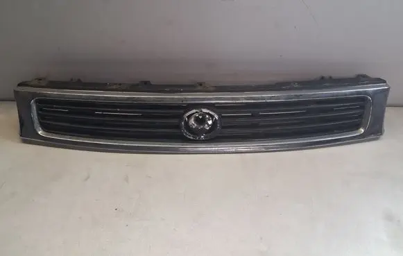 Mazda 626 Front bumper upper radiator grill