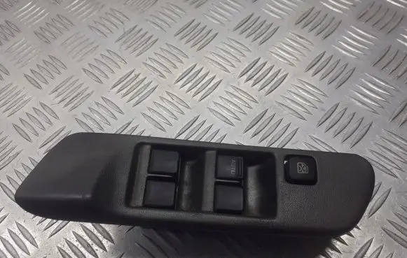 Nissan Primera Front door window switch trim 