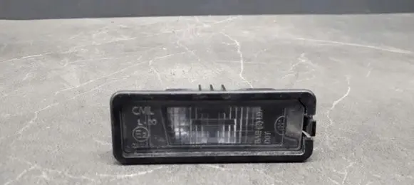 Volkswagen Golf VI Number plate light 1K8943021