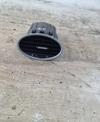 Dash center air vent grill