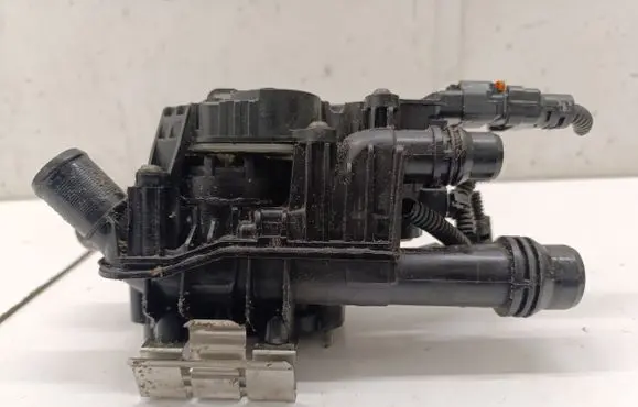 Thermostat/thermostat housing