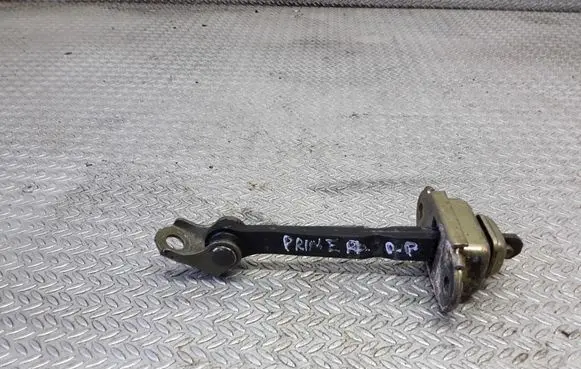 Nissan Primera Front door check strap stopper