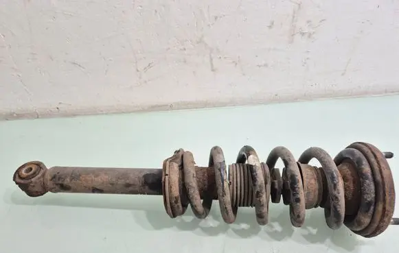 Mitsubishi Pajero Front shock absorber with coil spring 