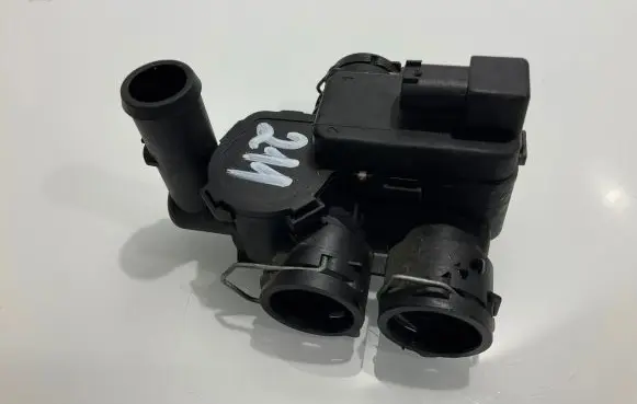 Coolant heater control valve
