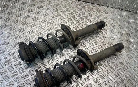 Volkswagen Golf VI Front shock absorber with coil spring