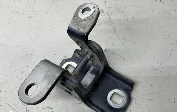 Front door lower hinge