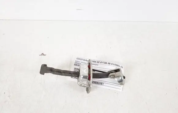 Toyota Aygo AB10 Rear door check strap stopper 68630-0H010