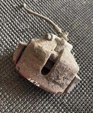 Volkswagen Jetta VI Front brake caliper 1K0615124D