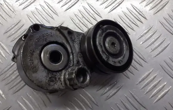 Opel Zafira B Alternator belt tensioner pulley 55556090AZ
