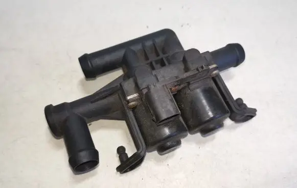 Coolant heater control valve