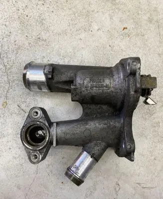 Thermostat/thermostat housing