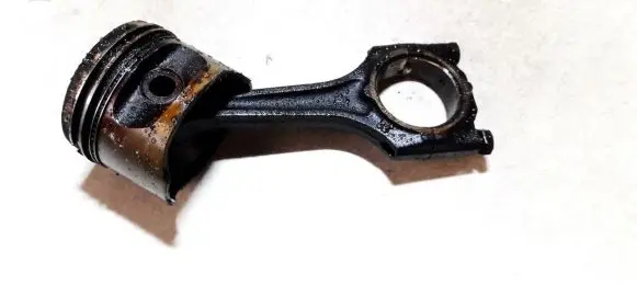 Opel Corsa B Piston with connecting rod