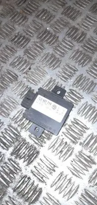 Volkswagen Touareg I Alarm control unit/module 7L0907719