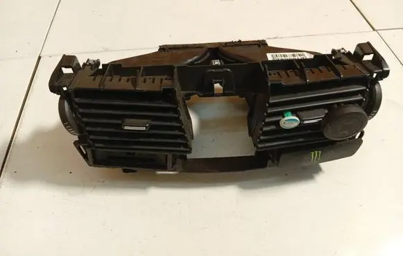 Dash center air vent grill