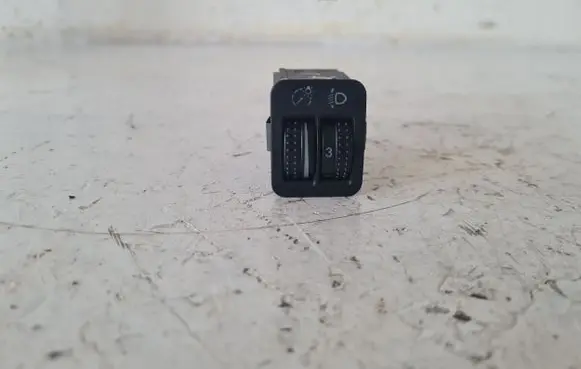 Headlight level height control switch